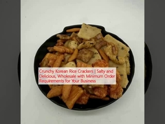 کریکر های برنج کره ای خرد کننده. نمک دار و خوشمزه، عمده فروشی با حداقل سفارش برای کسب و کار شما.